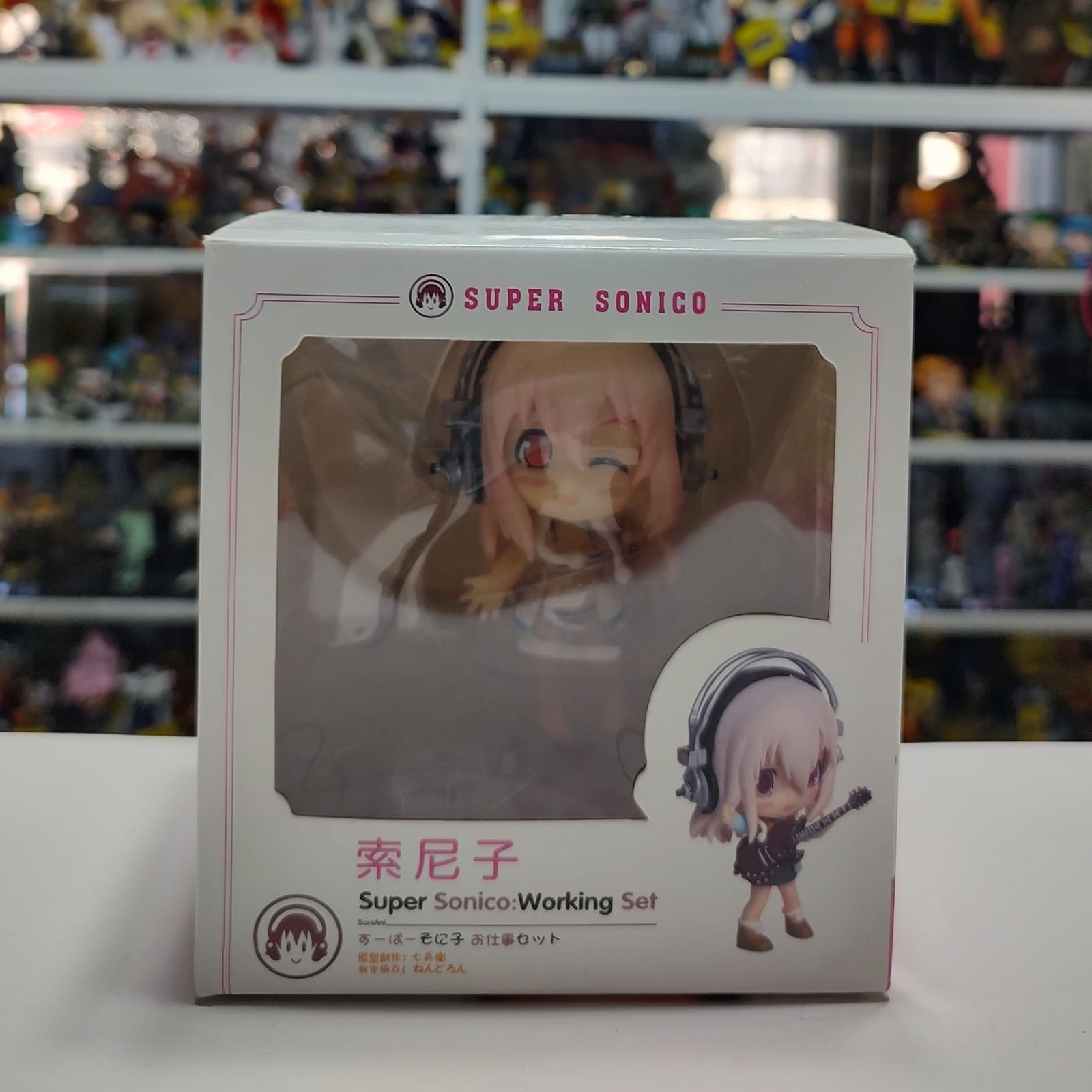 Figura Super Sonico: Working Set Veraniega
